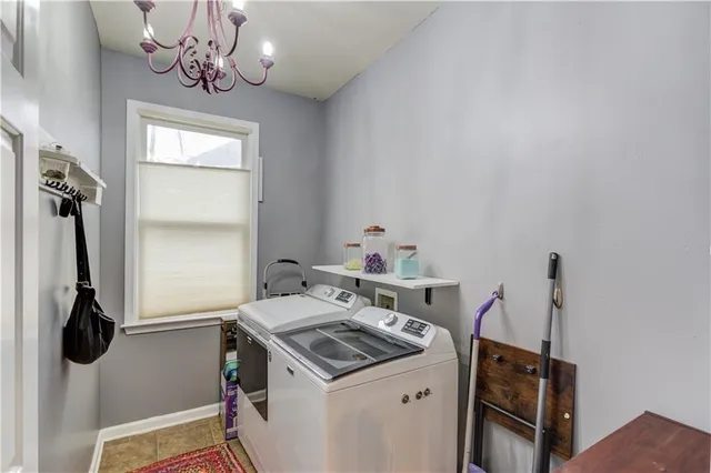 a bedroom with furniture and a fireplace