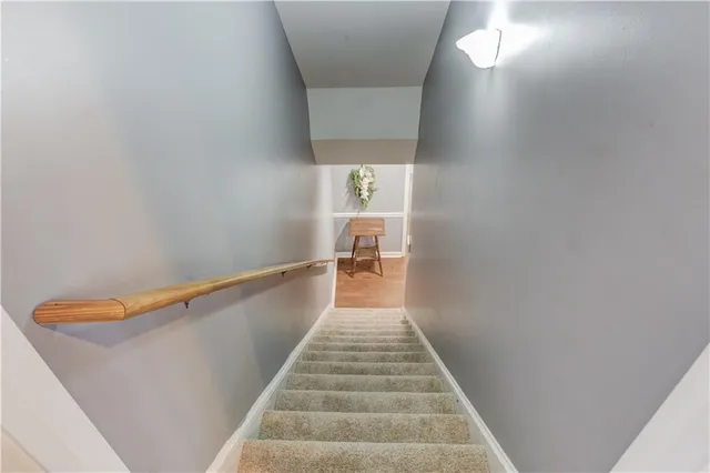 a view of a chairs and table in the patio