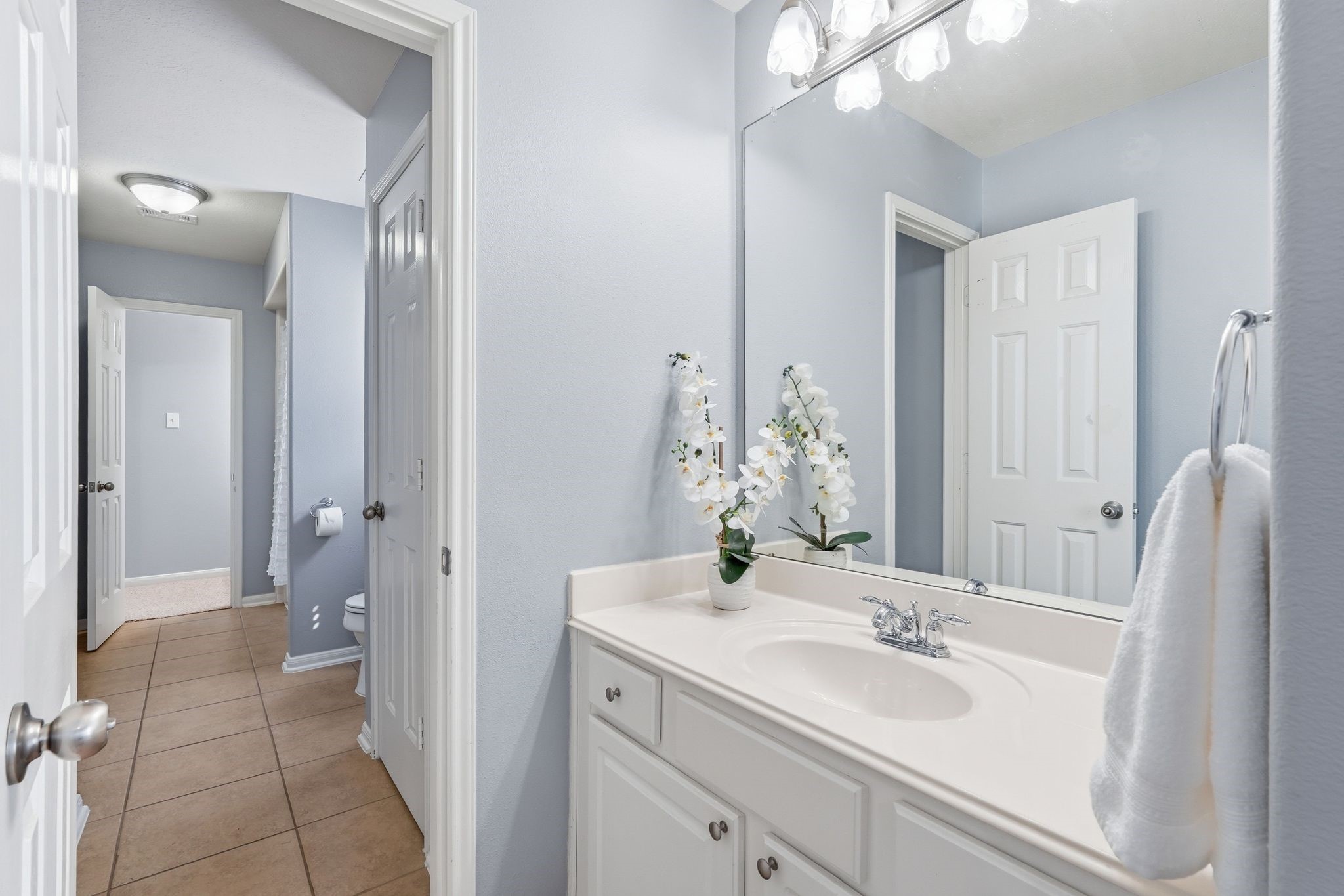 24931 Corbin Gate Drive Spring, TX 77389 - Photo 40 of 50 The jack and jill bathroom includes a tiled floor and neutral walls, creating a fresh and inviting atmosphere.