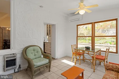a view of a chairs and tables in the patio