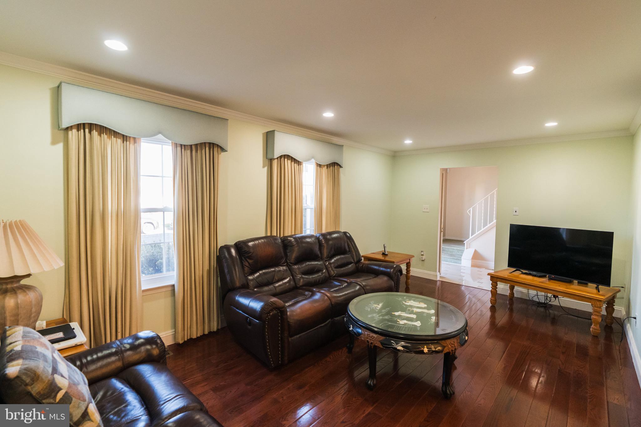 2 Danbridge Drive Horsham, PA 19044 - Photo 29 of 71 a living room with furniture and a flat screen tv