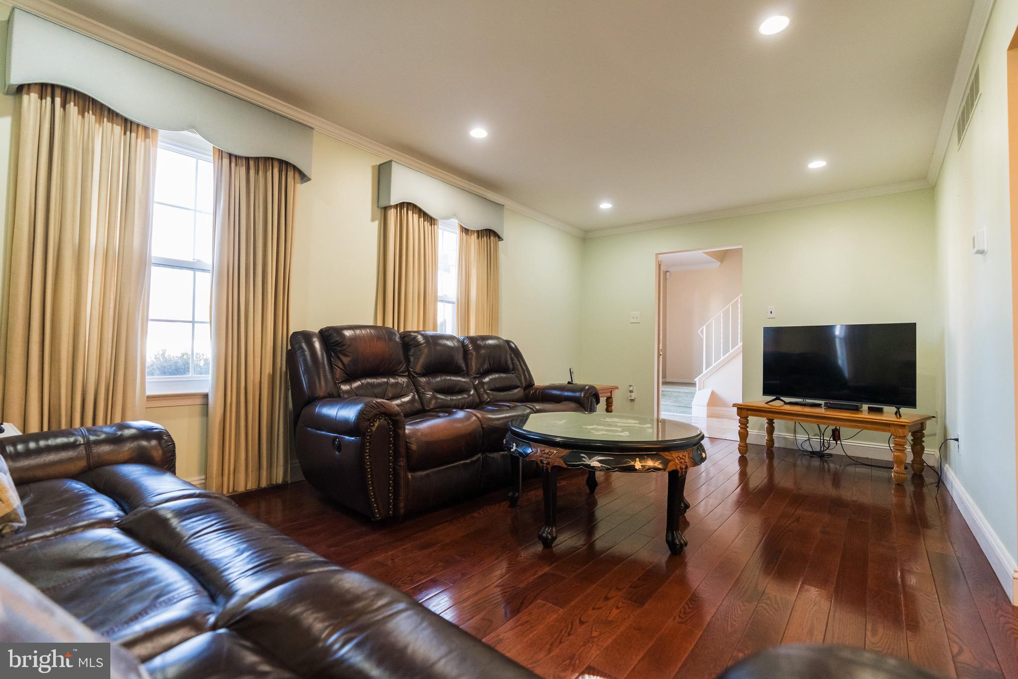 2 Danbridge Drive Horsham, PA 19044 - Photo 31 of 71 a living room with furniture and a flat screen tv