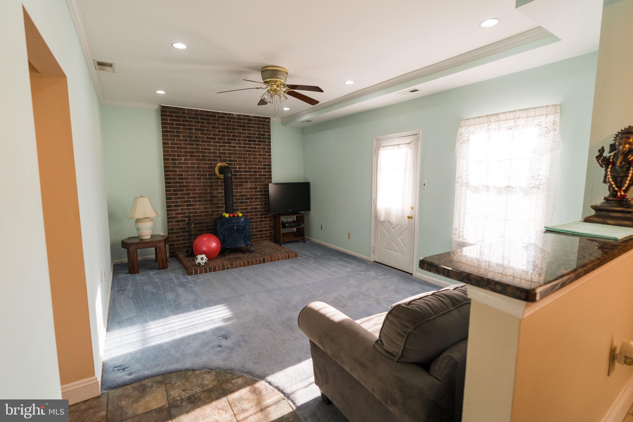 2 Danbridge Drive Horsham, PA 19044 - Photo 36 of 71 a living room with furniture and a fireplace