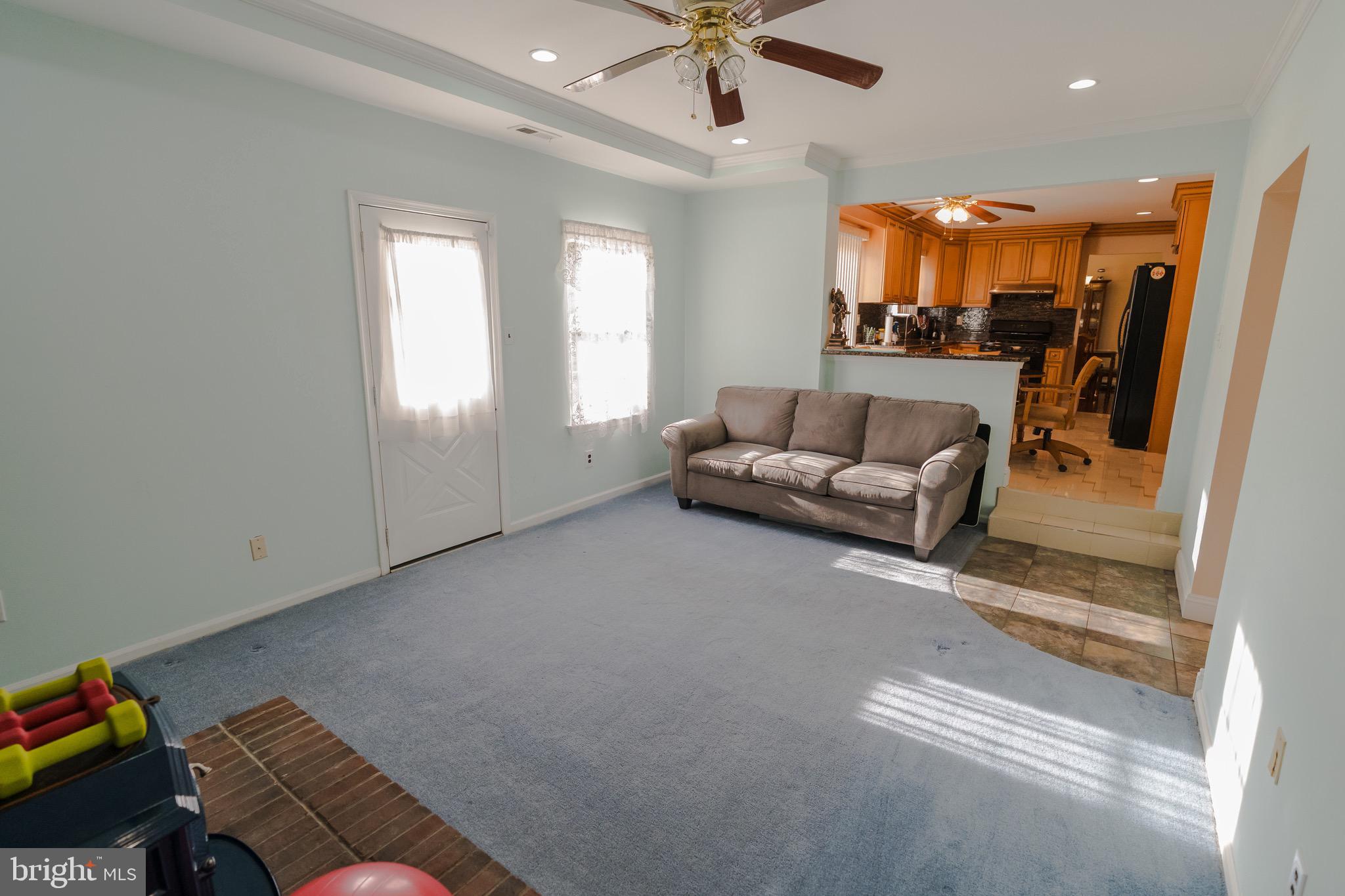 2 Danbridge Drive Horsham, PA 19044 - Photo 38 of 71 a living room with furniture and a chandelier