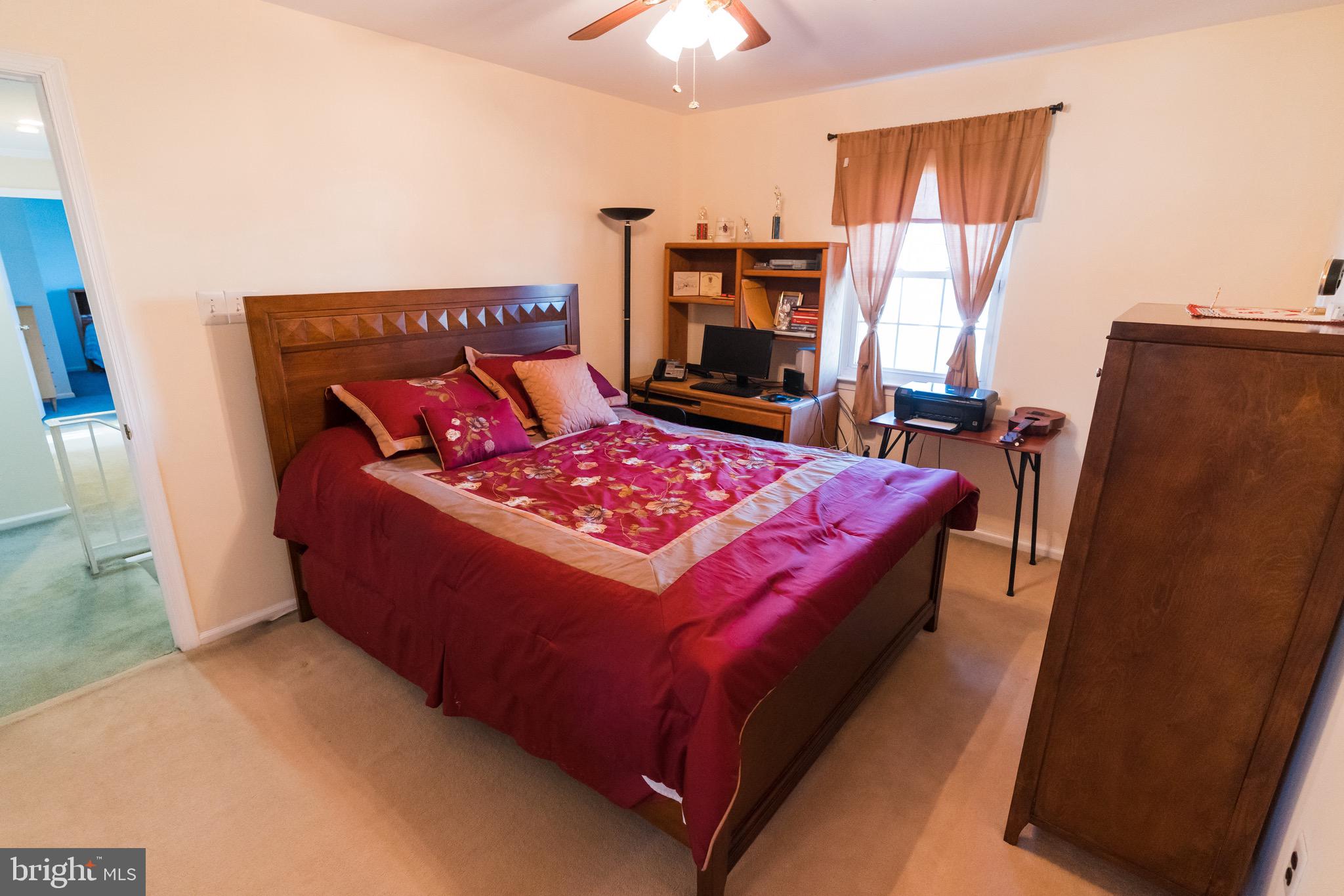 2 Danbridge Drive Horsham, PA 19044 - Photo 49 of 71 a bed sitting in a bedroom next to a window