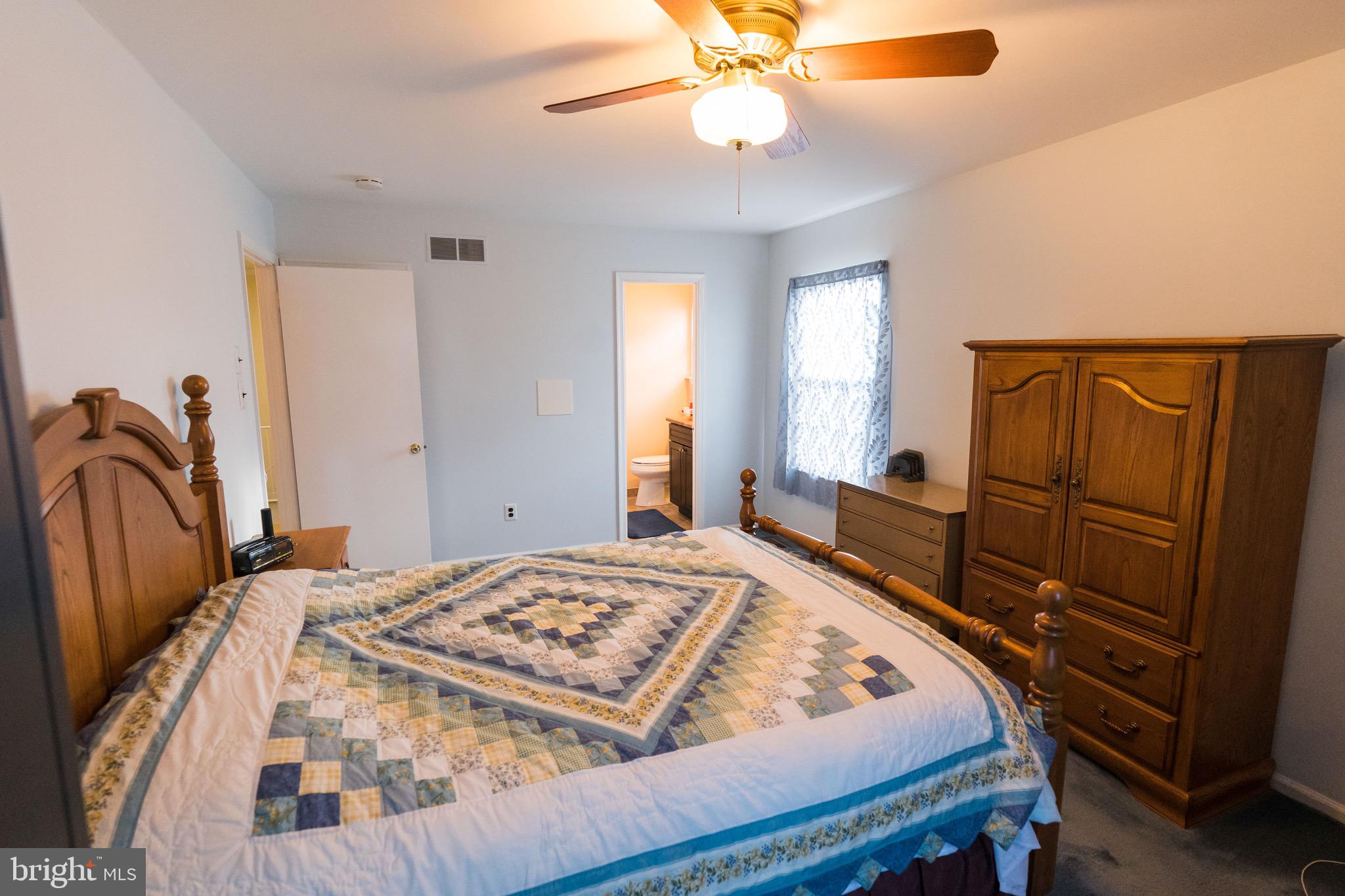 2 Danbridge Drive Horsham, PA 19044 - Photo 63 of 71 a bedroom with a bed and wooden floor