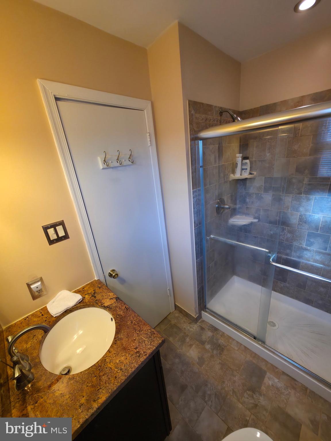 2 Danbridge Drive Horsham, PA 19044 - Photo 65 of 71 a bathroom with a granite countertop sink and a mirror