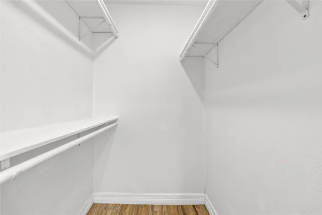 a view of a room with racks on the wall