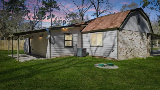 a view of a back yard of the house