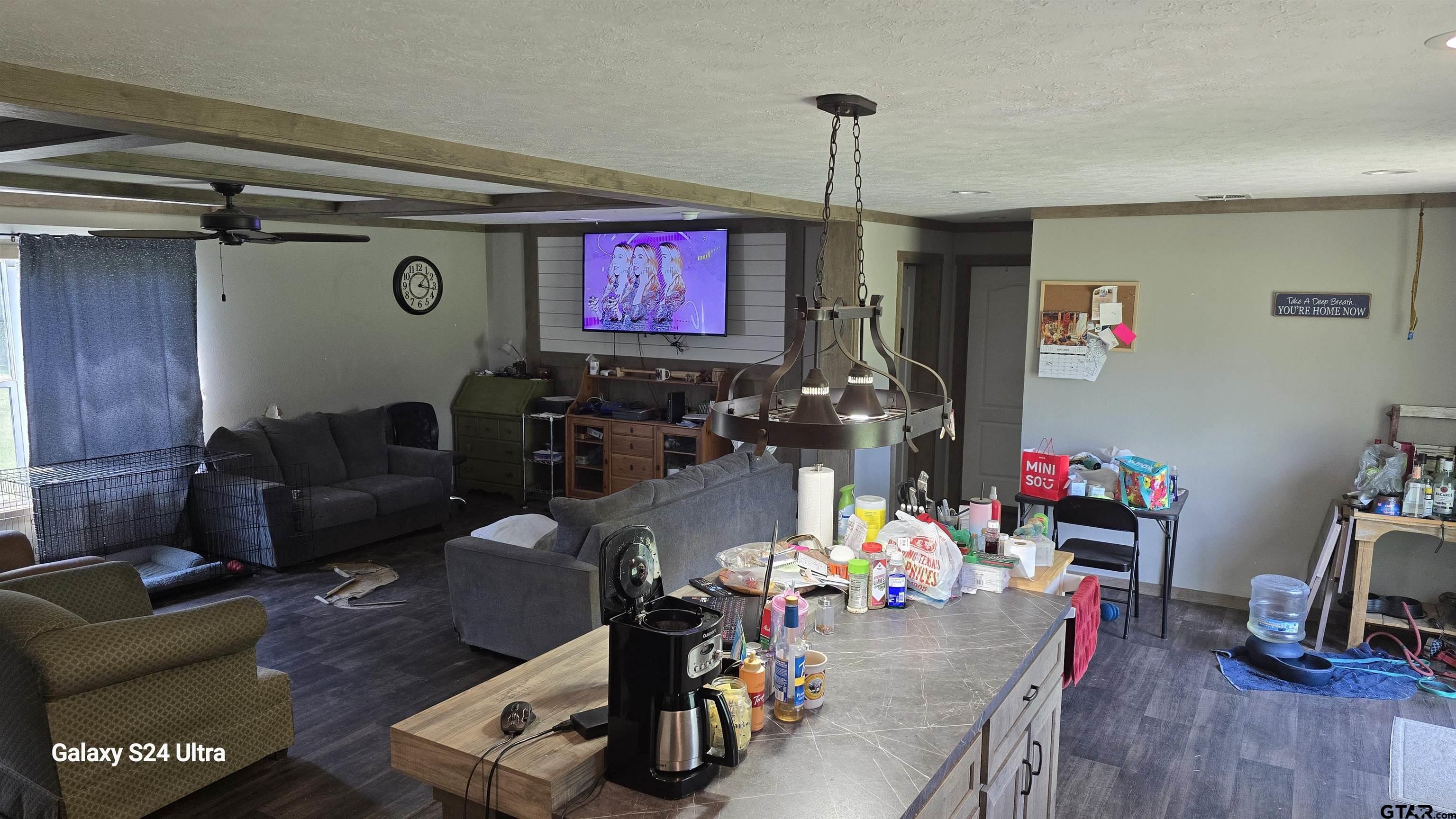 873 East Texas Road Lufkin, TX 75901 - Photo 2 of 12 a living room with furniture and a wooden floor