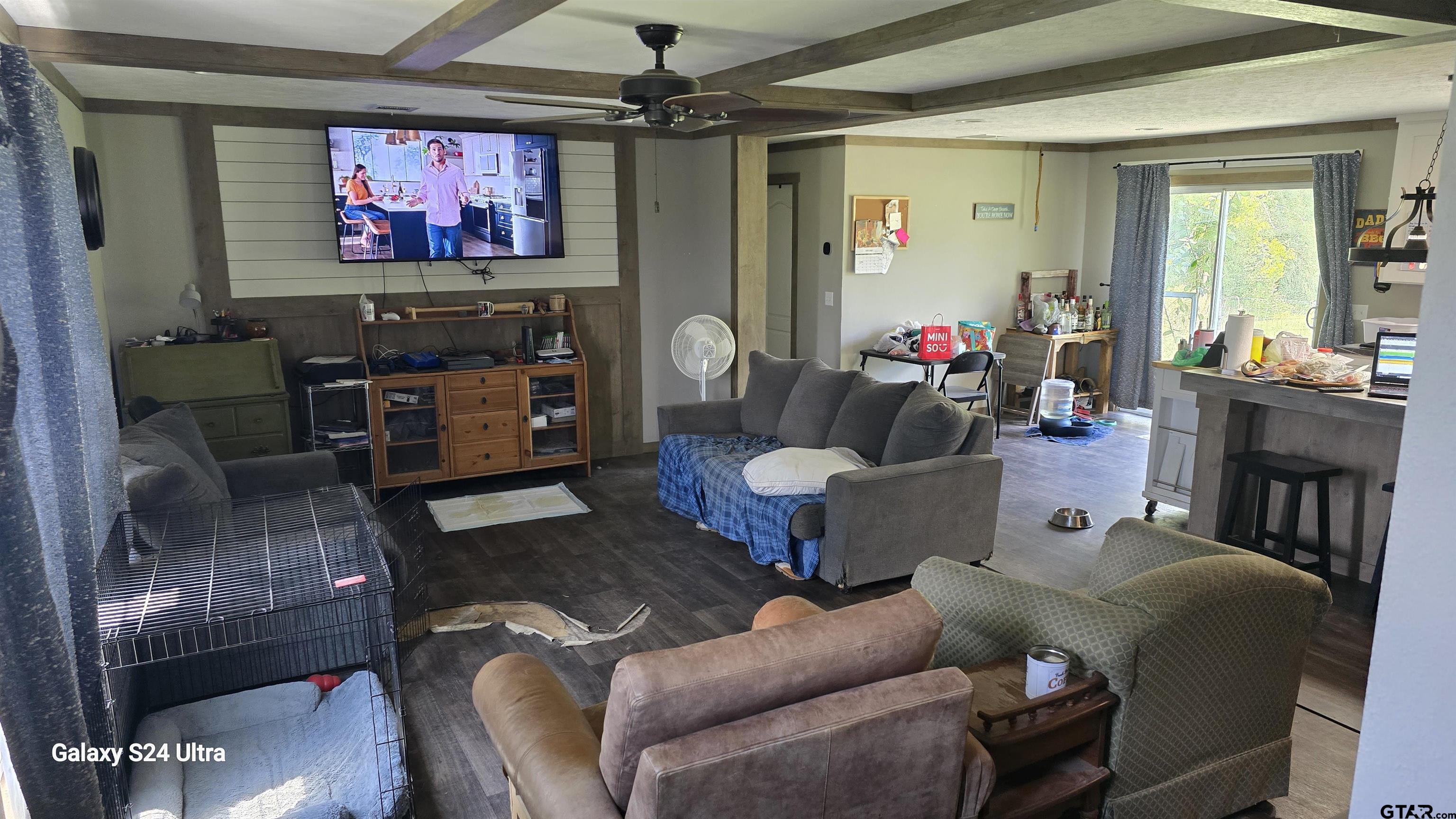 873 East Texas Road Lufkin, TX 75901 - Photo 4 of 12 a living room with furniture and a flat screen tv