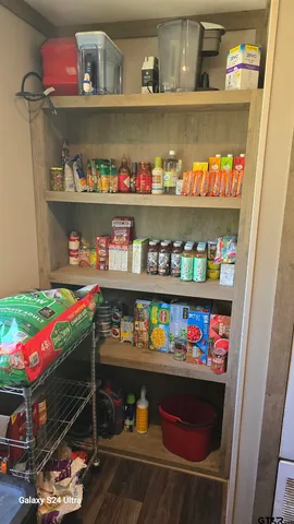 a room with toys and storage area