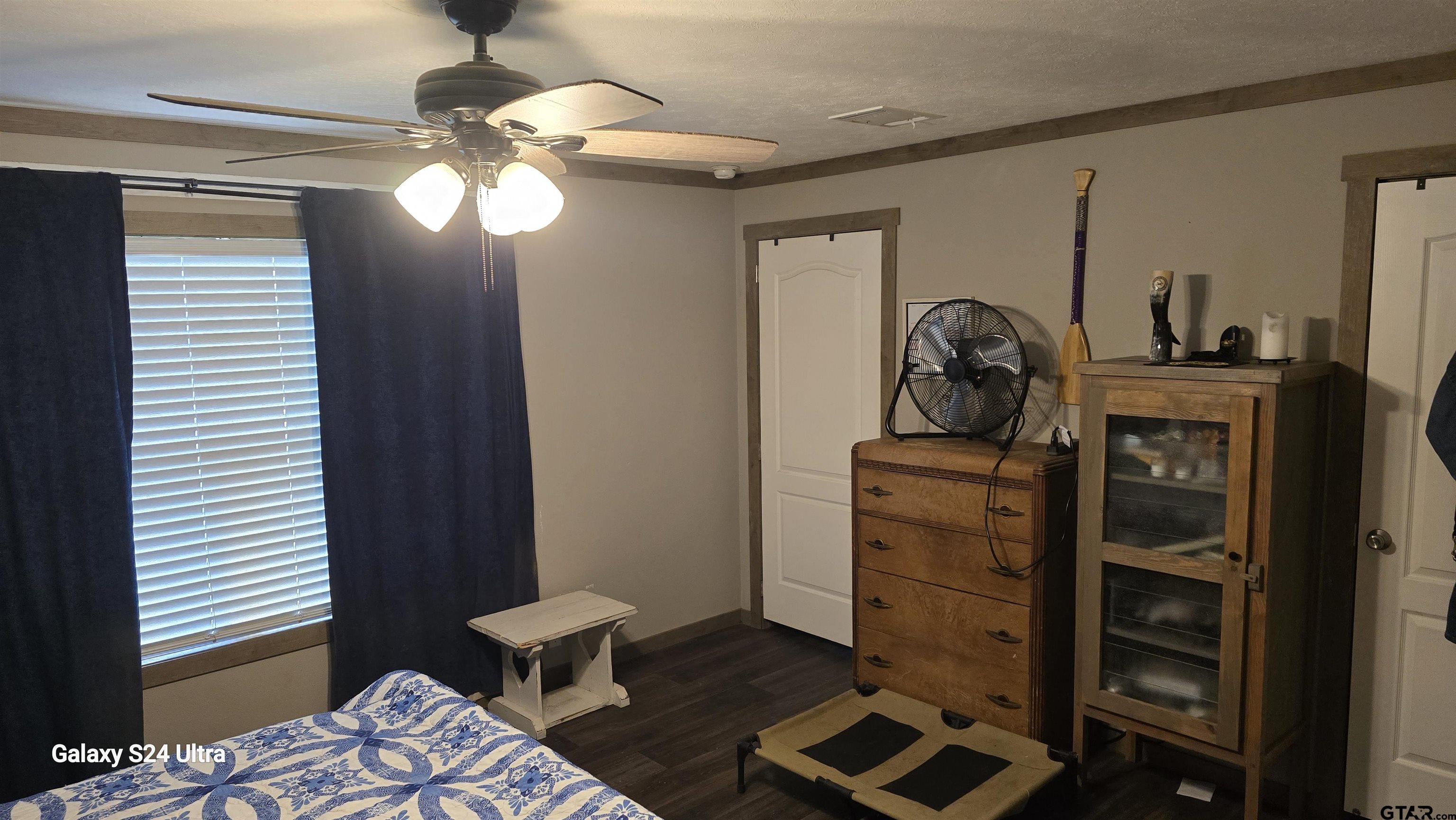 873 East Texas Road Lufkin, TX 75901 - Photo 10 of 12 a view of a bedroom with baby bed