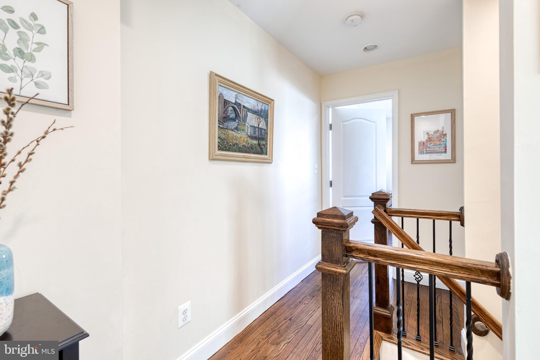 1205 Roland Heights Avenue Baltimore, MD 21211 - Photo 20 of 36 a view of a hallway with windows