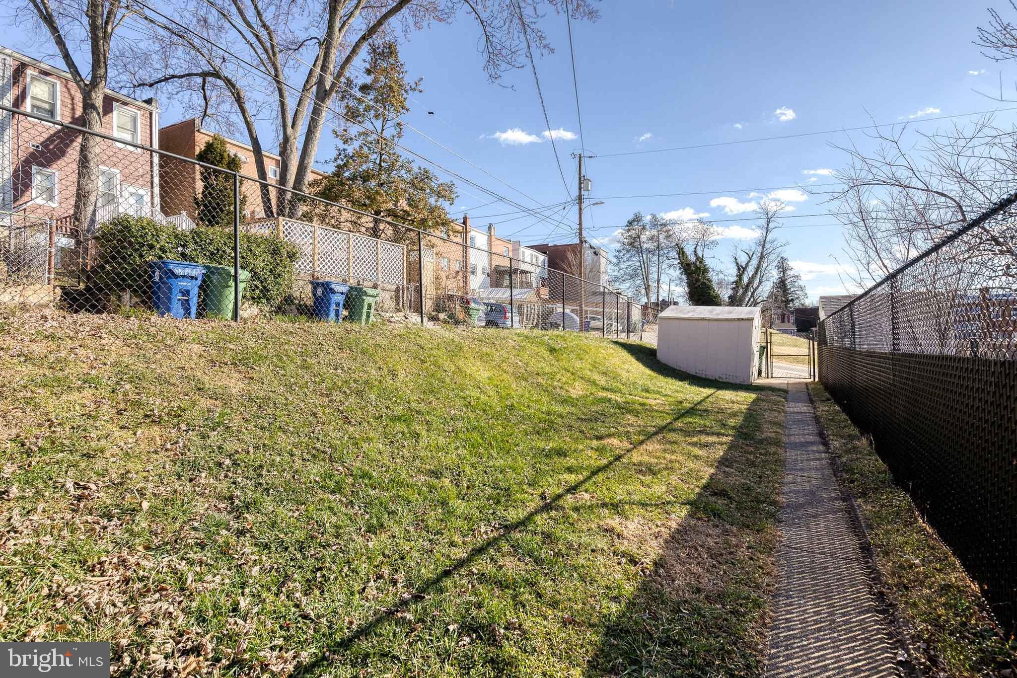 1205 Roland Heights Avenue Baltimore, MD 21211 - Photo 32 of 36 a view of a building with a outdoor space