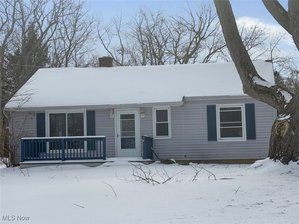 7094 Lake Road Madison, OH 44057 - Photo 1 of 20 Ranch-style home with a chimney