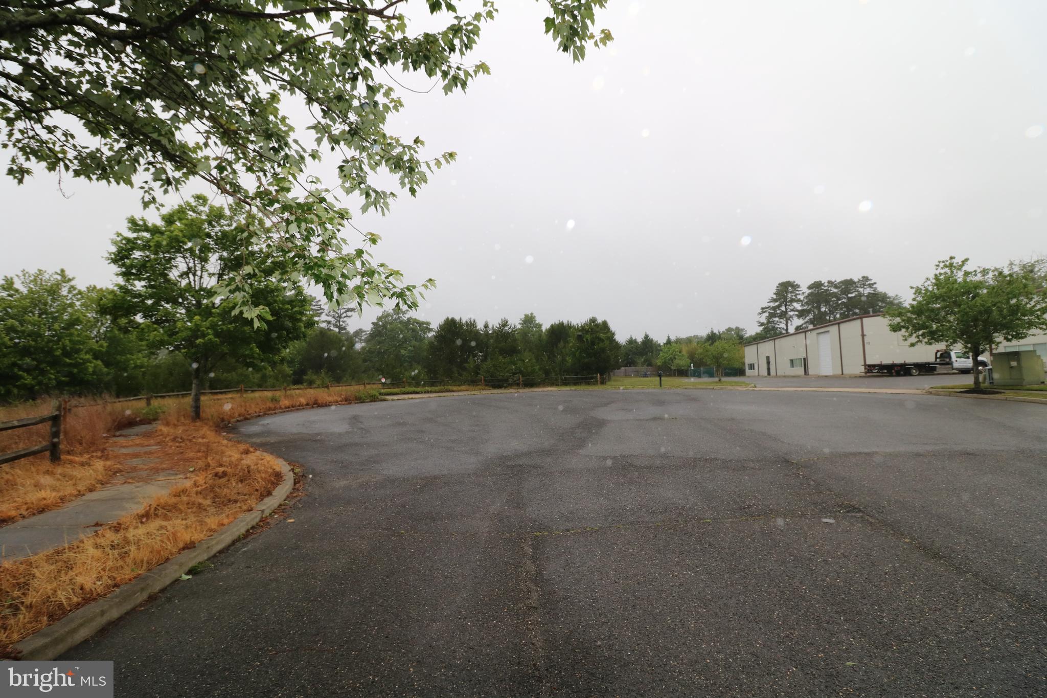 11 Travis Way Tuckerton, NJ 08087 - Photo 1 of 6 a view of a street with an trees