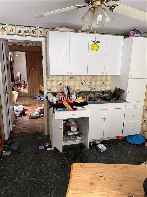 348 Musick Street Hannastown, PA 15635 - Photo 8 of 20 a kitchen with kitchen island granite countertop a sink and a stove