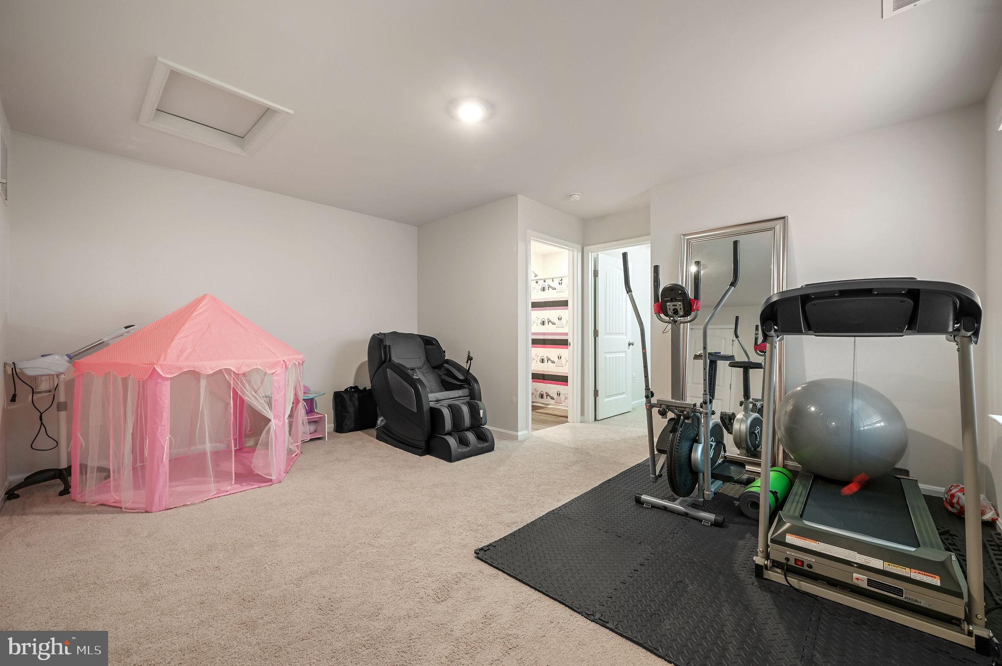 157 Clear Stream Drive Dover, DE 19904 - Photo 13 of 17 a view of a room with gym equipment