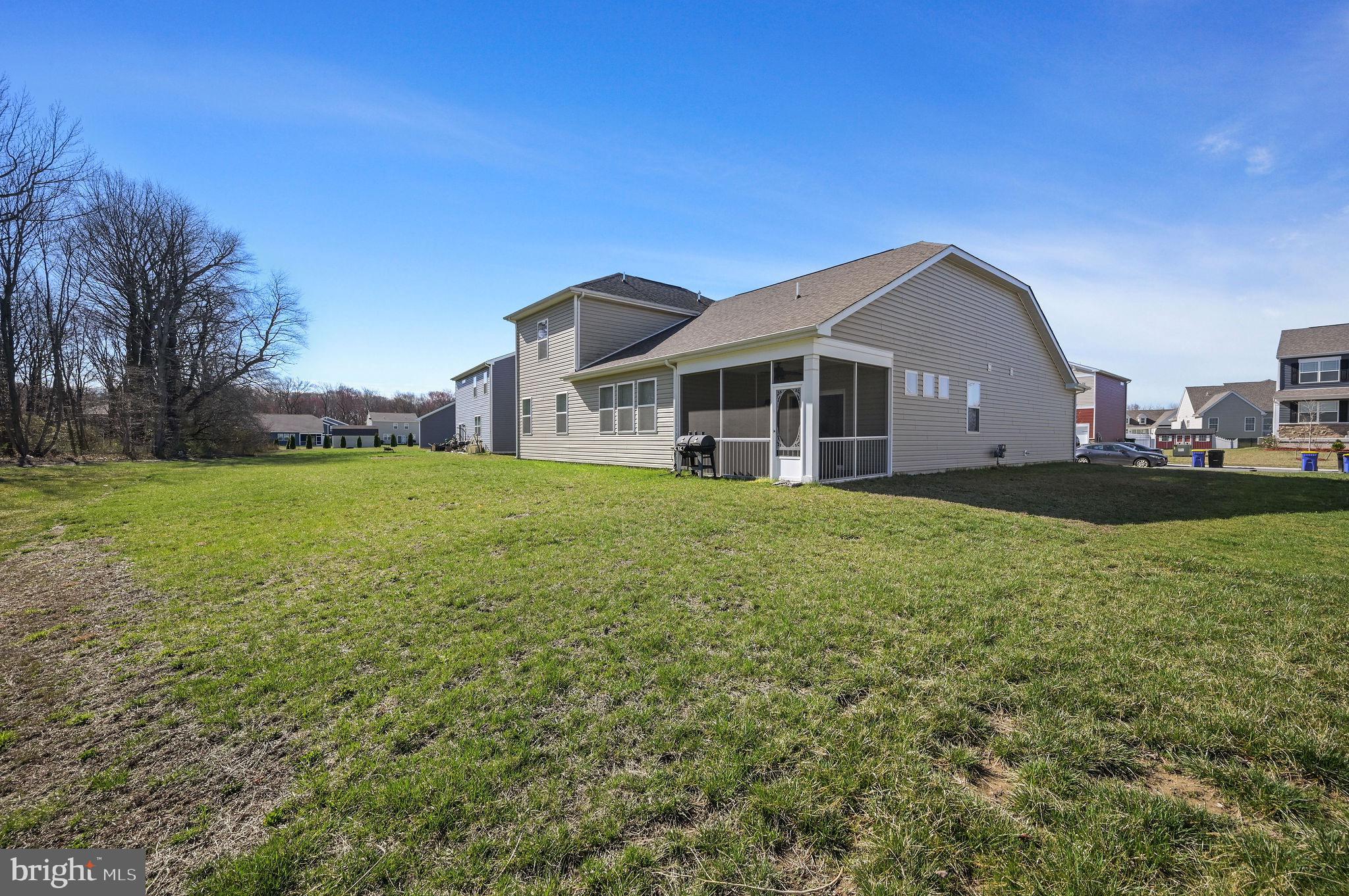 157 Clear Stream Drive Dover, DE 19904 - Photo 17 of 17 a view of a house with a big yard
