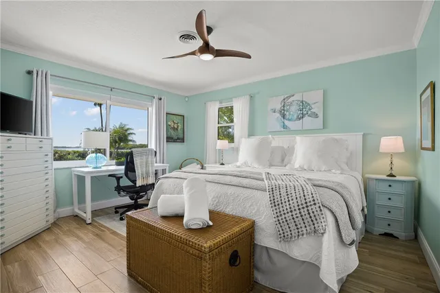 a bedroom with a bed and furniture