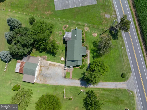 an aerial view of a house with a garden