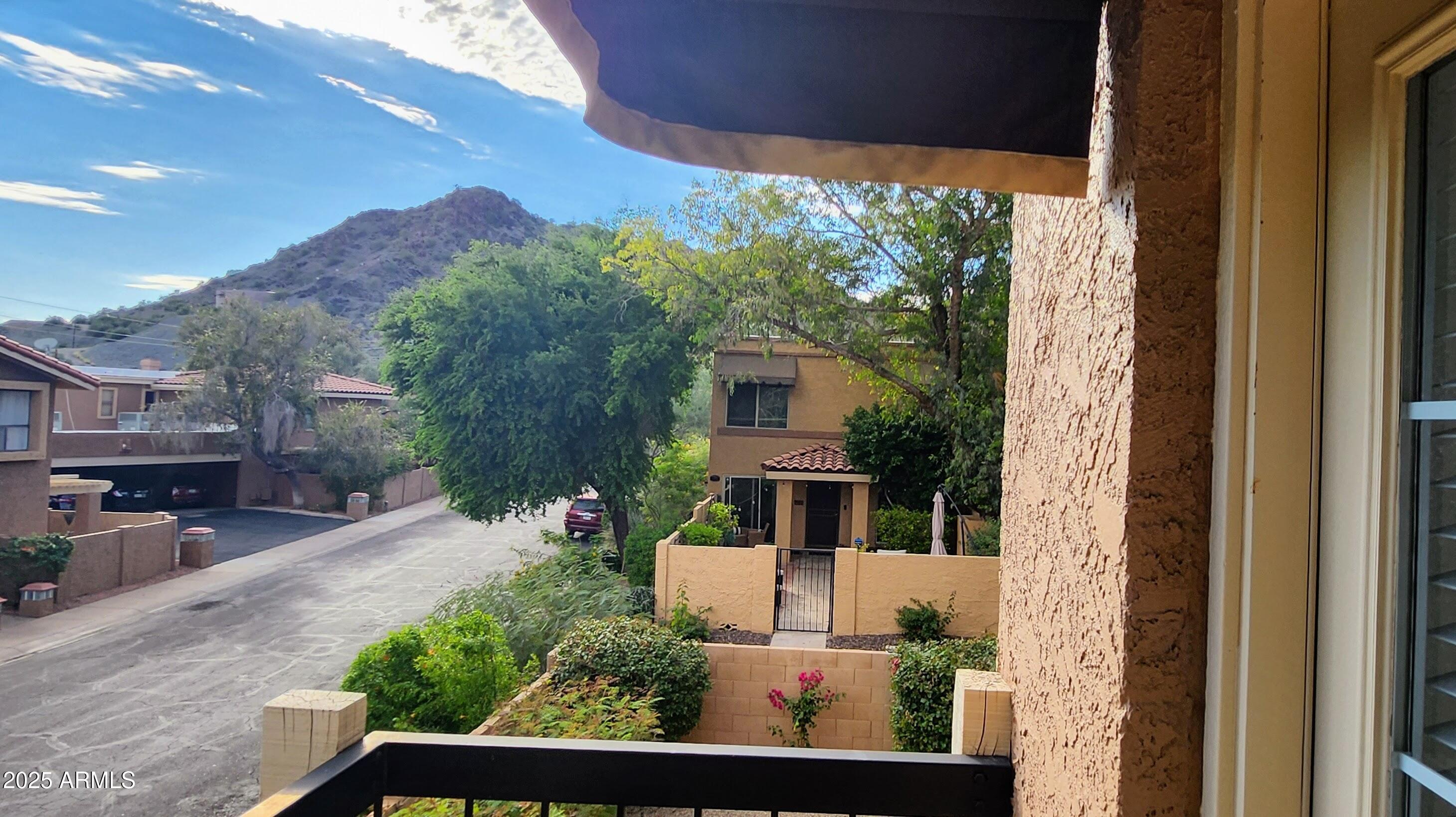 730 East North Lane, Unit 2 Phoenix, AZ 85020 - Photo 17 of 17 a view of house with a yard