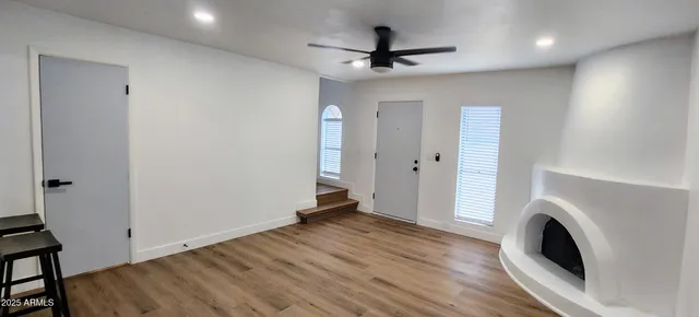 a view of livingroom with washer and dryer