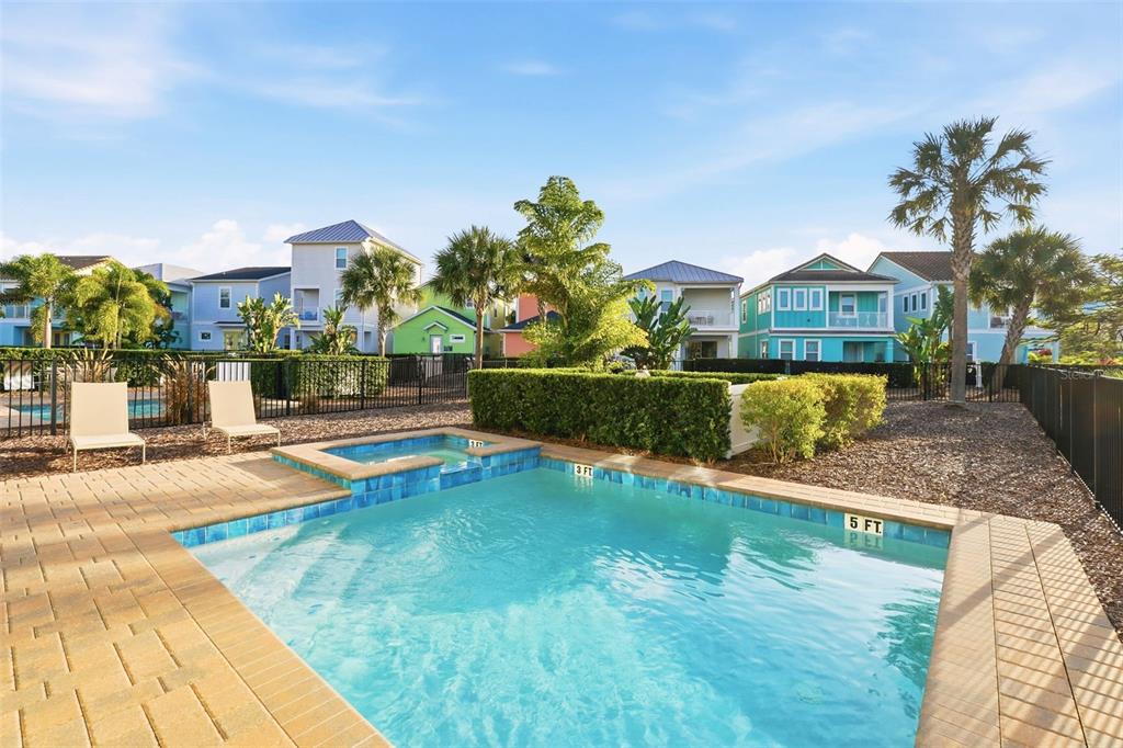 8098 Knee Deep Road Kissimmee, FL 34747 - Photo 35 of 40 a view of a house with swimming pool