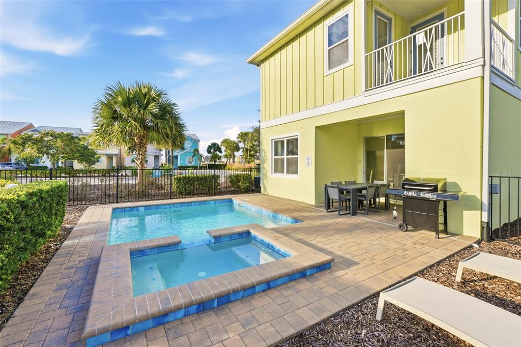 8098 Knee Deep Road Kissimmee, FL 34747 - Photo 37 of 40 a view of a swimming pool with chairs