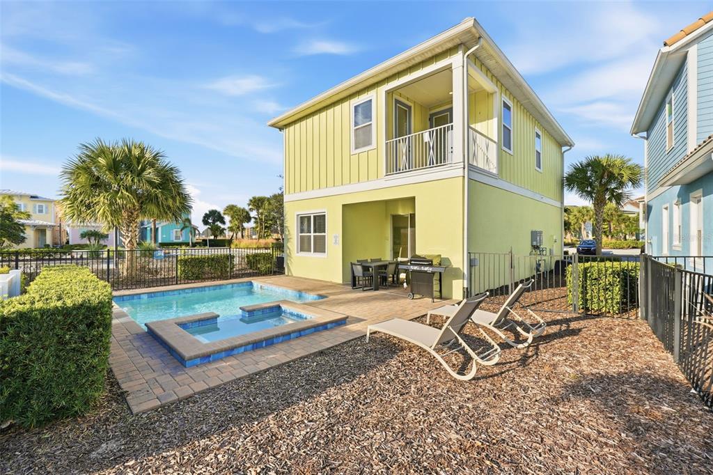 8098 Knee Deep Road Kissimmee, FL 34747 - Photo 38 of 40 a view of a backyard with a patio