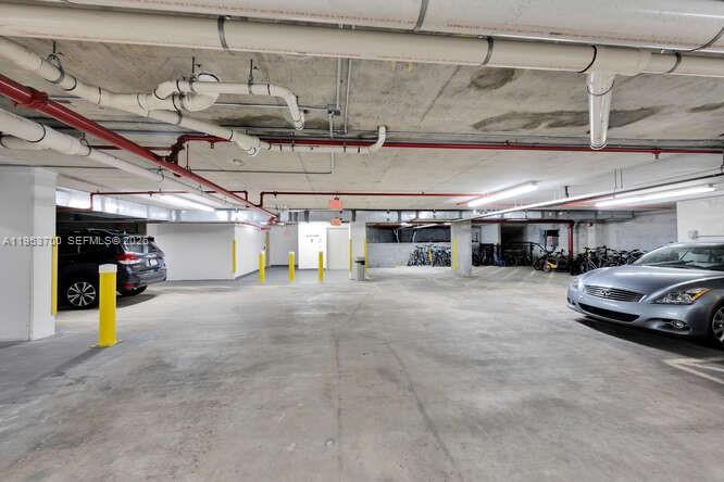 8395 Southwest 73rd Avenue, Unit 104 Miami, FL 33143 - Photo 27 of 35 a view of a garage with furniture