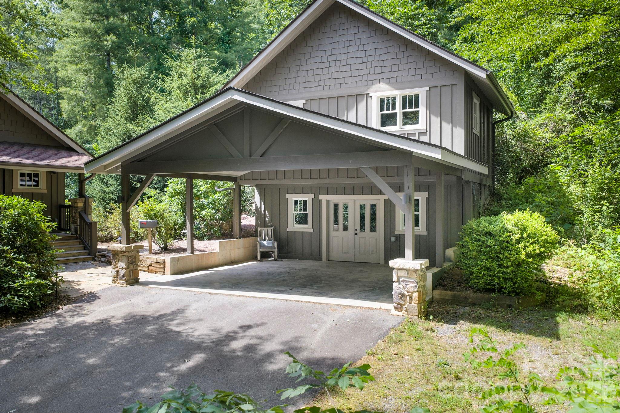 235 Bull Creek Road Asheville, NC 28805 - Photo 35 of 47 a front view of a house with garden