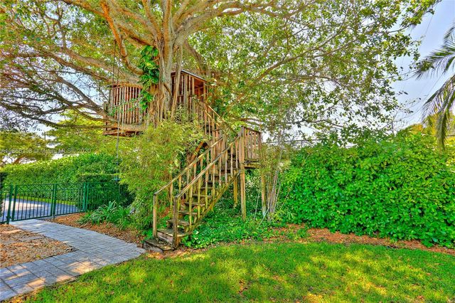 a living room with a garden and plants