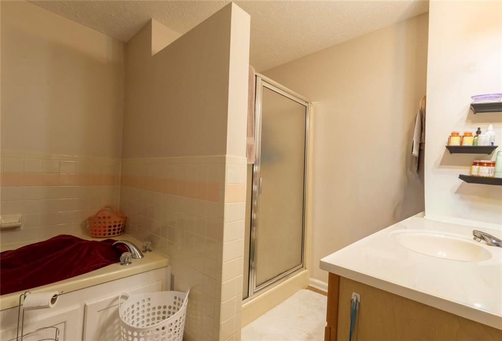 160 Highway 320 Carnesville, GA 30521 - Photo 17 of 68 a bathroom with a sink a vanity and a mirror