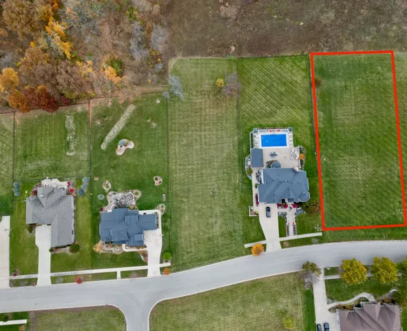 an aerial view of a house having patio