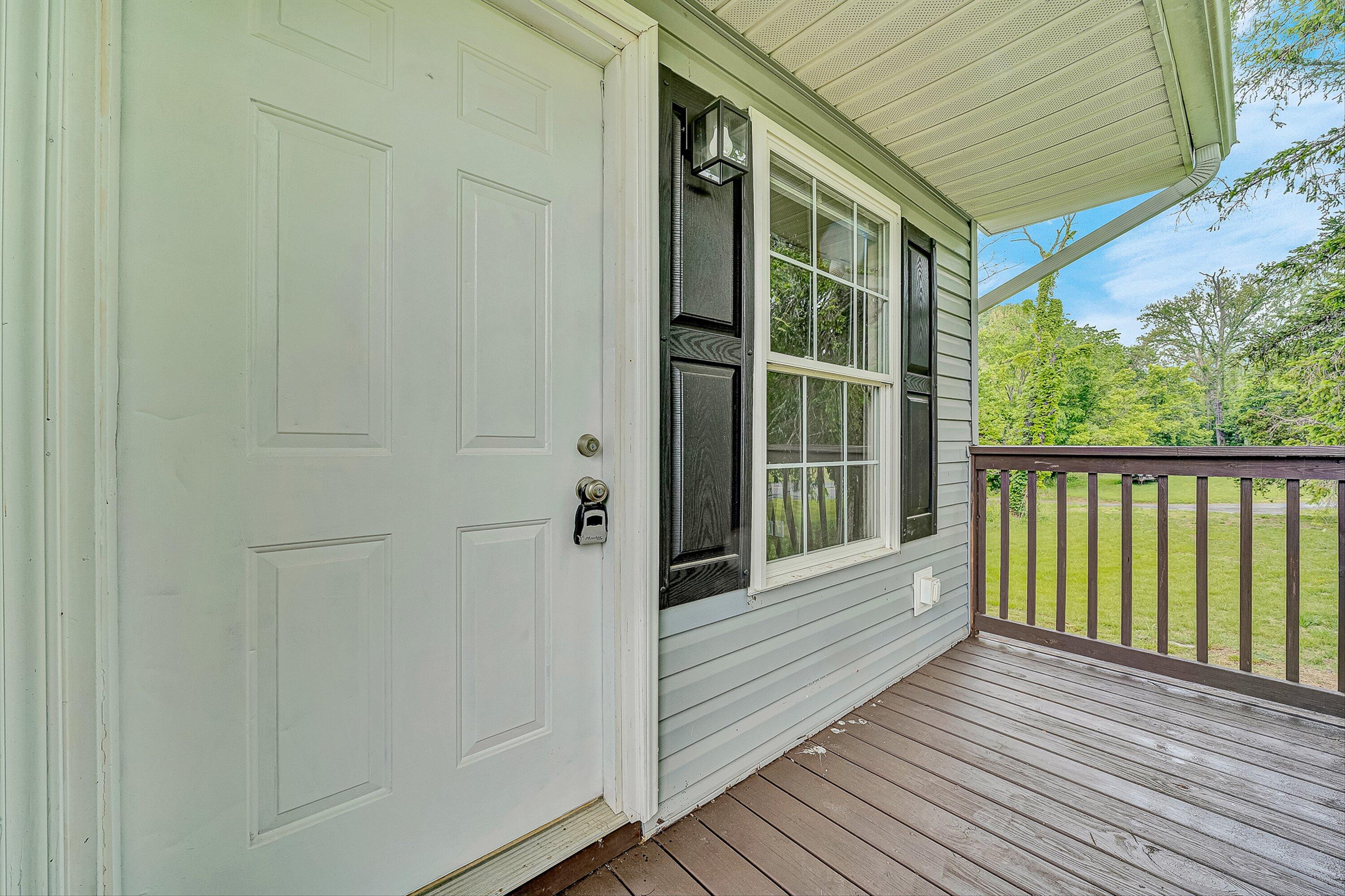 9619 Old Roanoke Road Elliston, VA 24087 - Photo 2 of 29 a view of a wooden deck