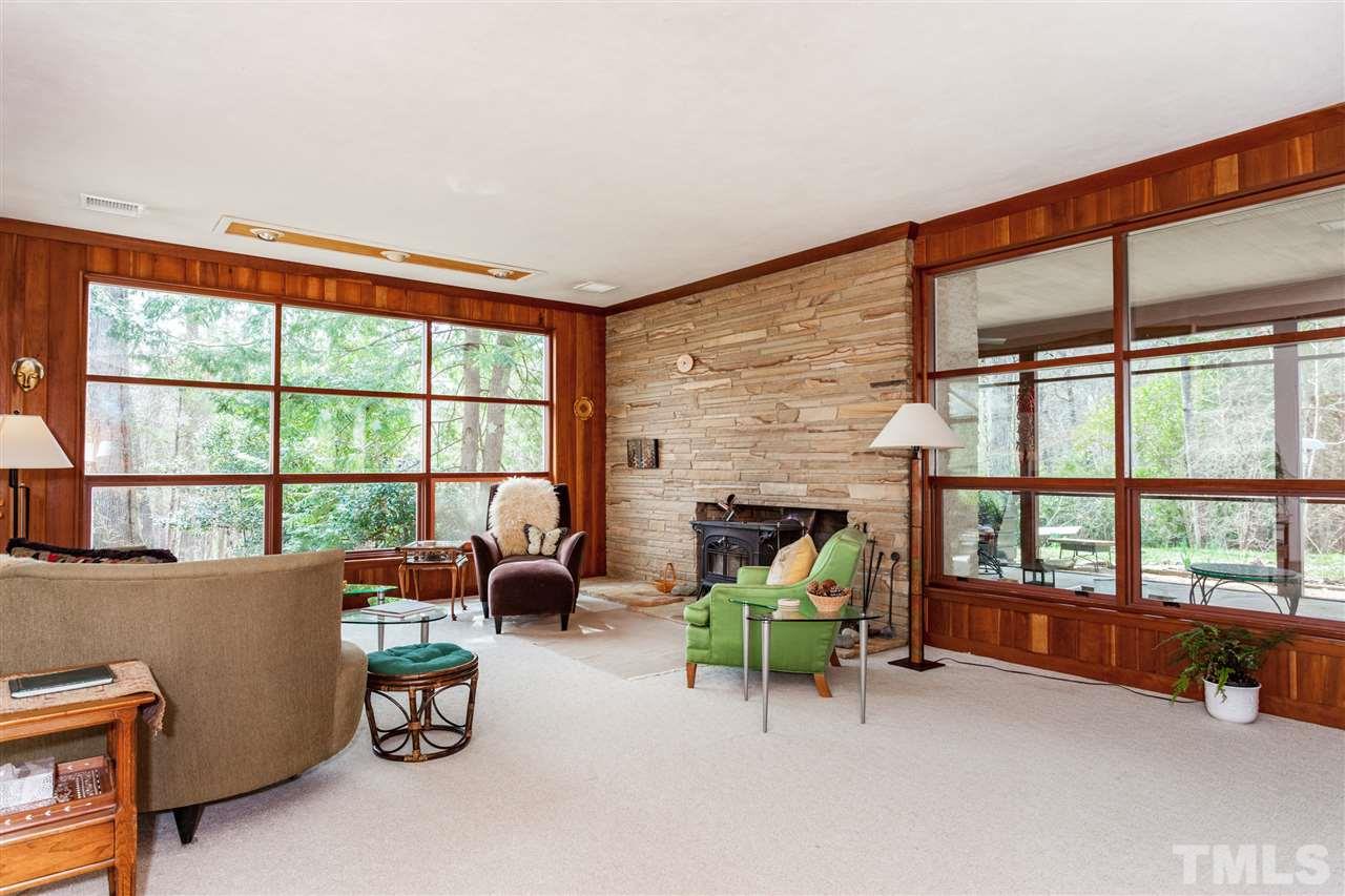 3413 Rugby Road Durham, NC 27707 - Photo 4 of 25 Lots of light and wonderful fireplace wall.