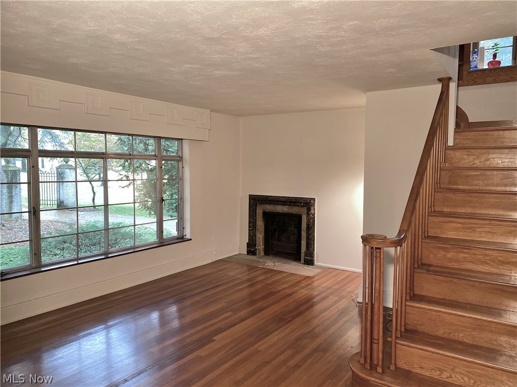 5875 Mill Road Broadview Heights, OH 44147 - Photo 6 of 31 Enter into spacious living room with large picture window and wood burning fireplace