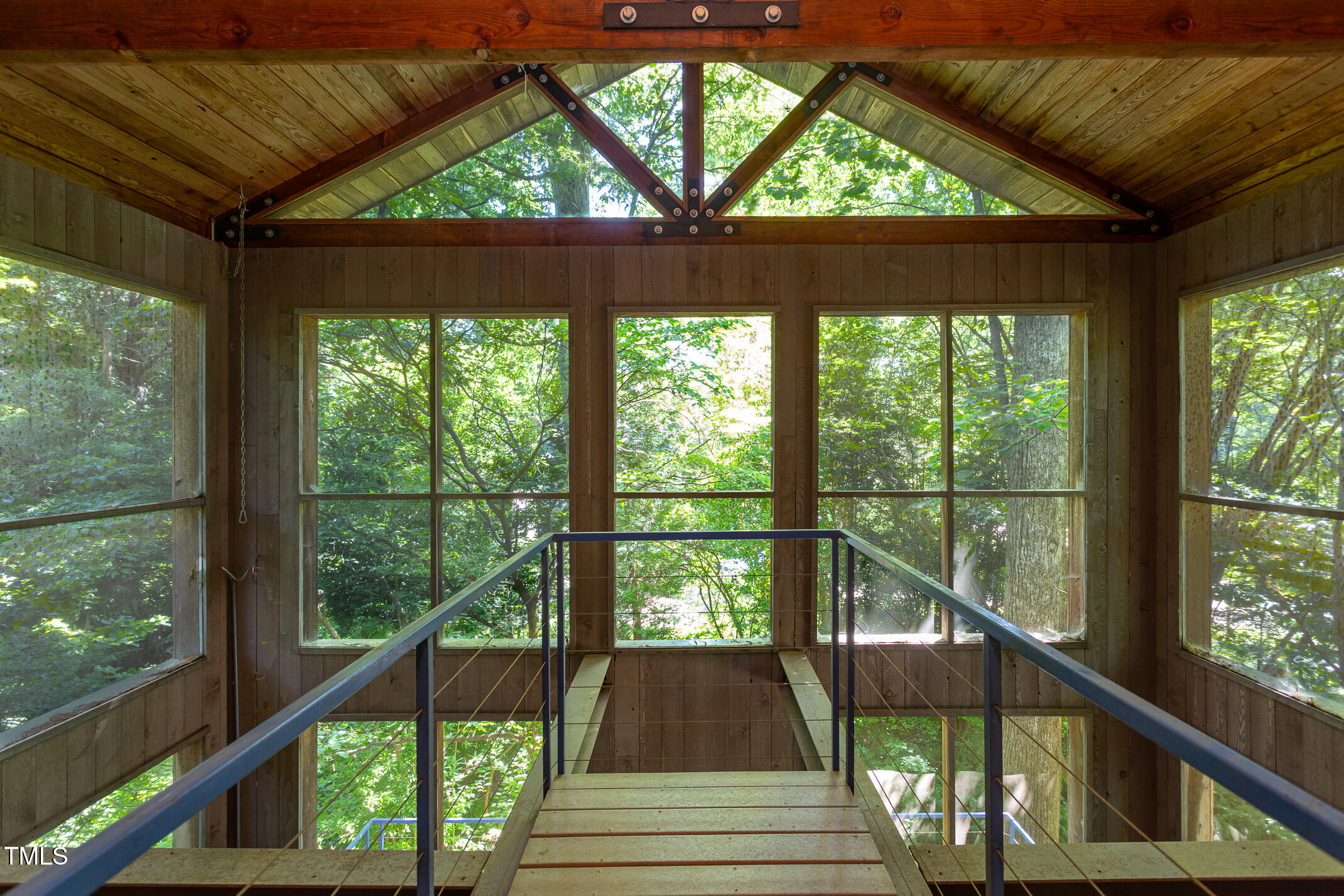 820 Runnymede Road Raleigh, NC 27607 - Photo 22 of 43 a view of balcony with wooden floor