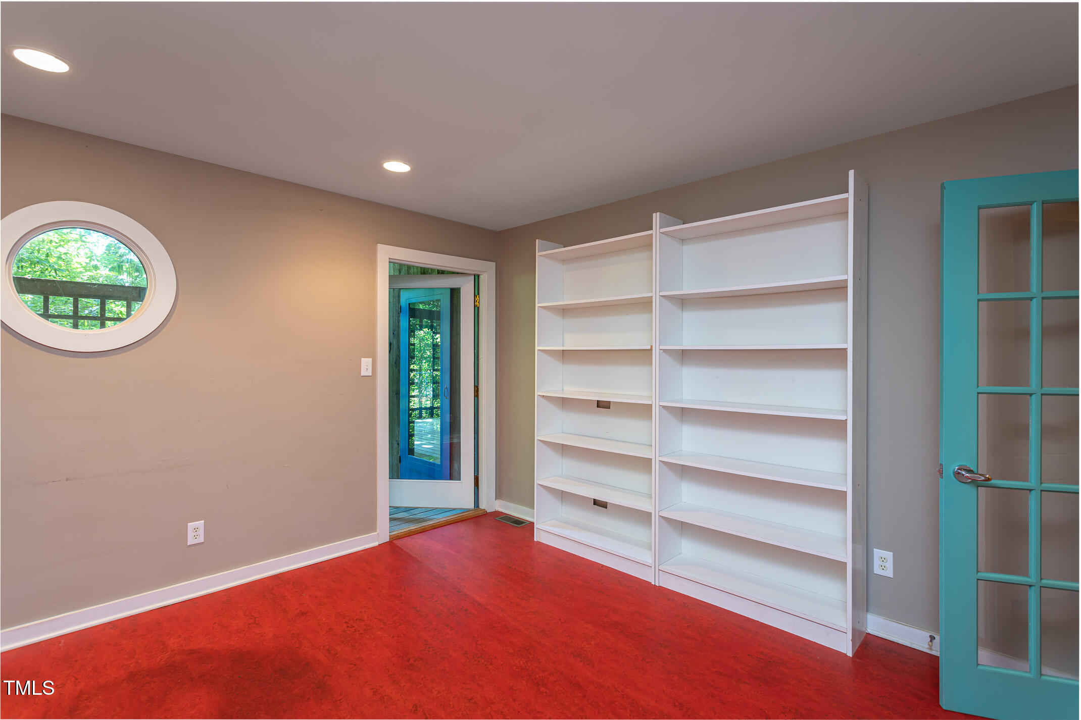 820 Runnymede Road Raleigh, NC 27607 - Photo 31 of 43 a view of room with window and wooden floor