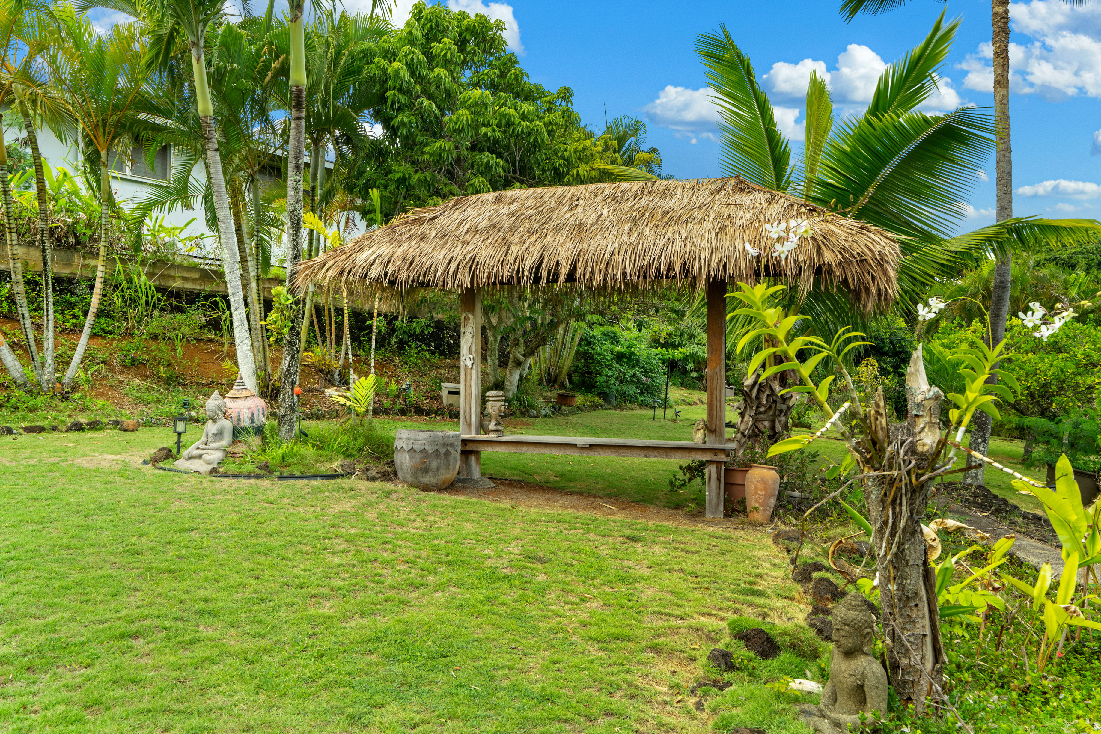 4885 Laipo Road Kapaa, HI 96746 - Photo 23 of 28 a view of backyard with swimming pool and green space