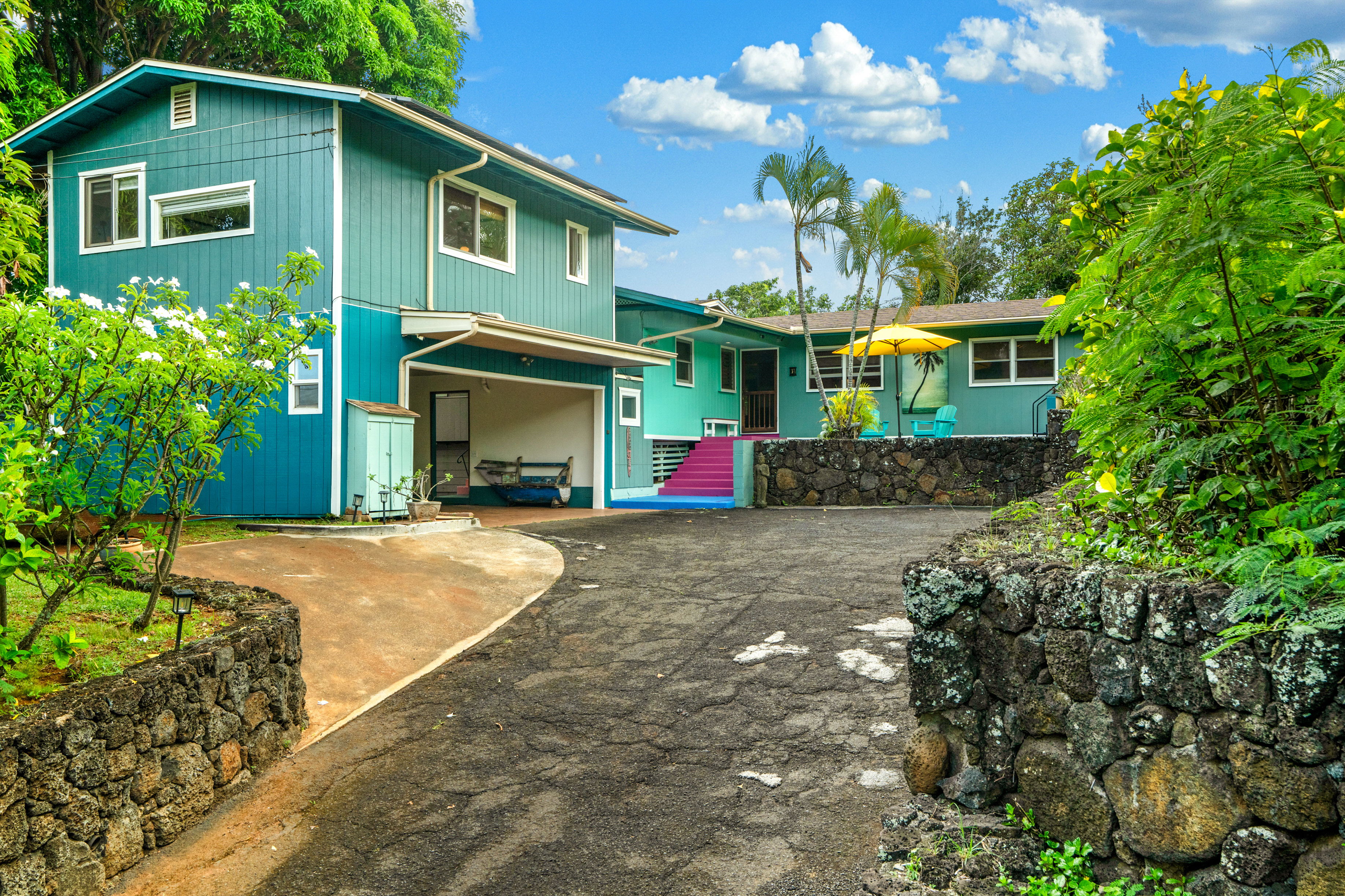 4885 Laipo Road Kapaa, HI 96746 - Photo 26 of 28 a front view of a house with a yard