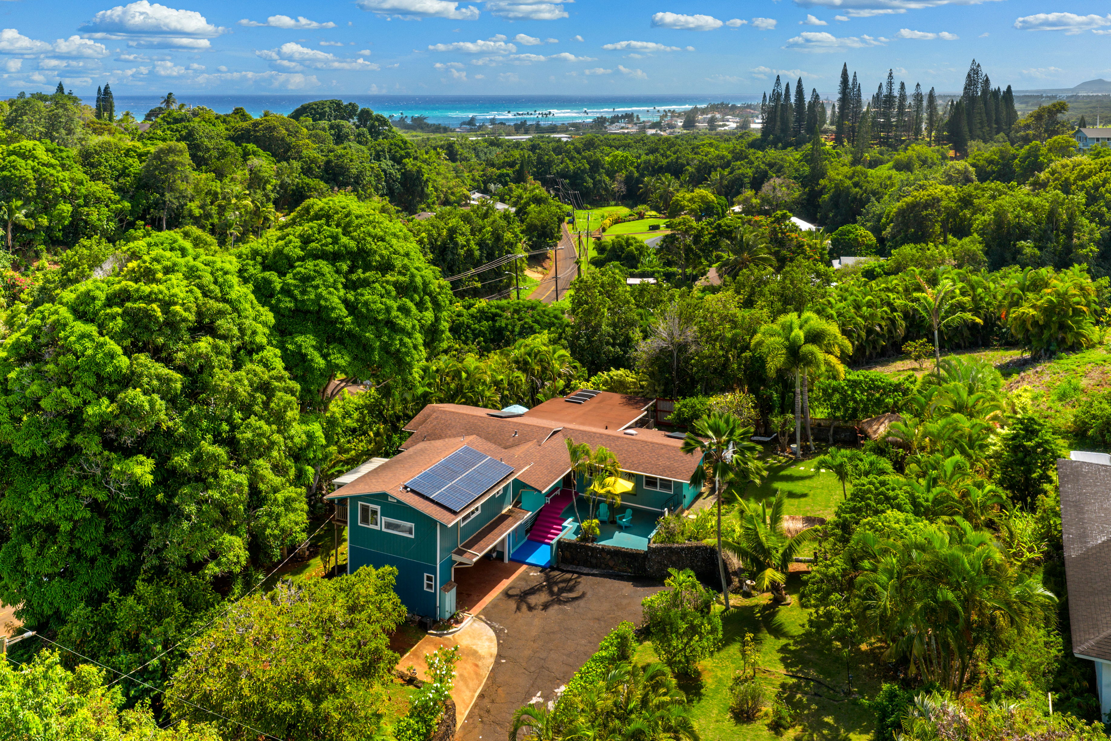 4885 Laipo Road Kapaa, HI 96746 - Photo 28 of 28 a view of a house with a yard and sitting area