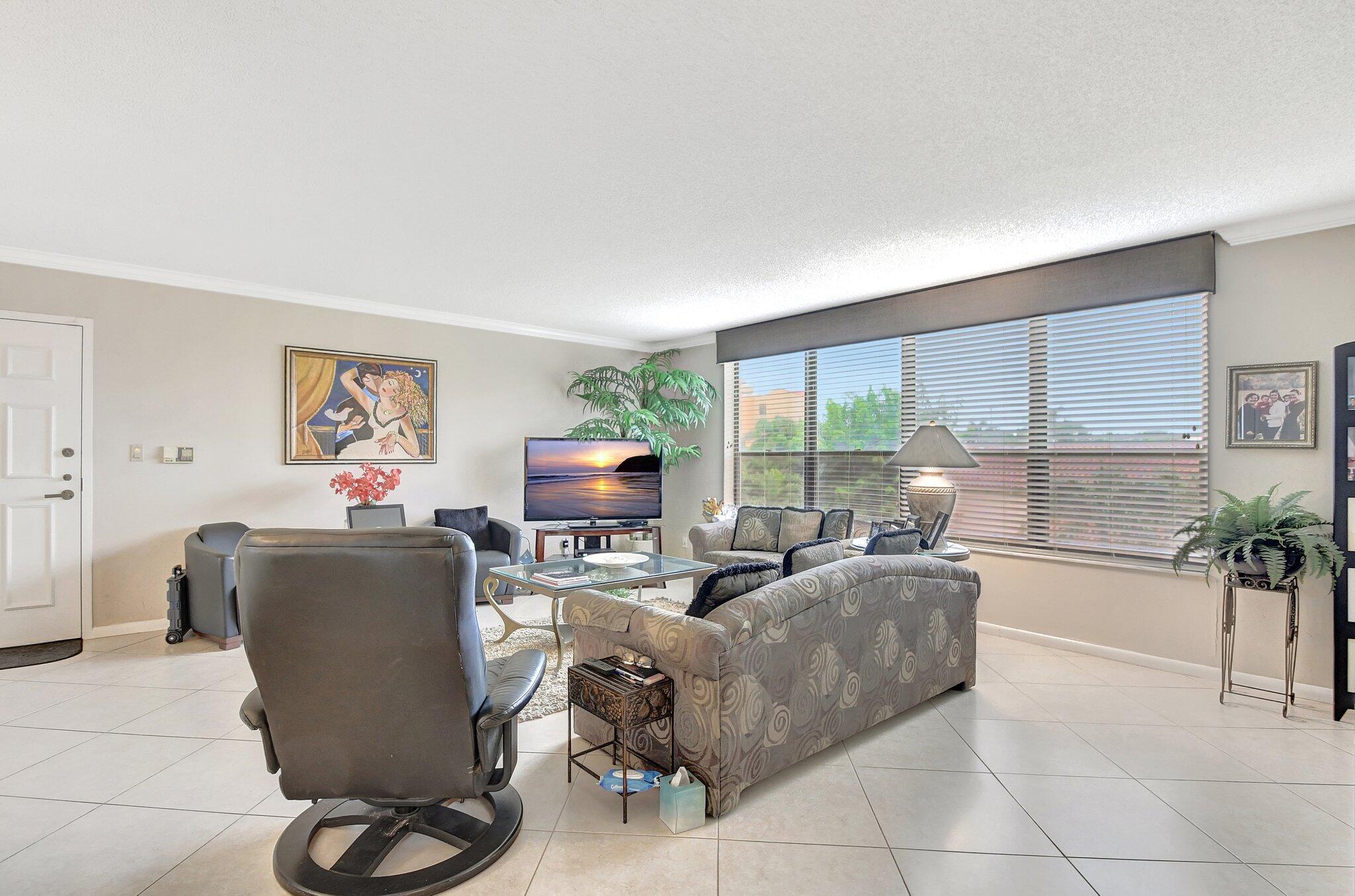 7209 Promenade Drive, Unit 302 Boca Raton, FL 33433 - Photo 2 of 36 Entry and Living room