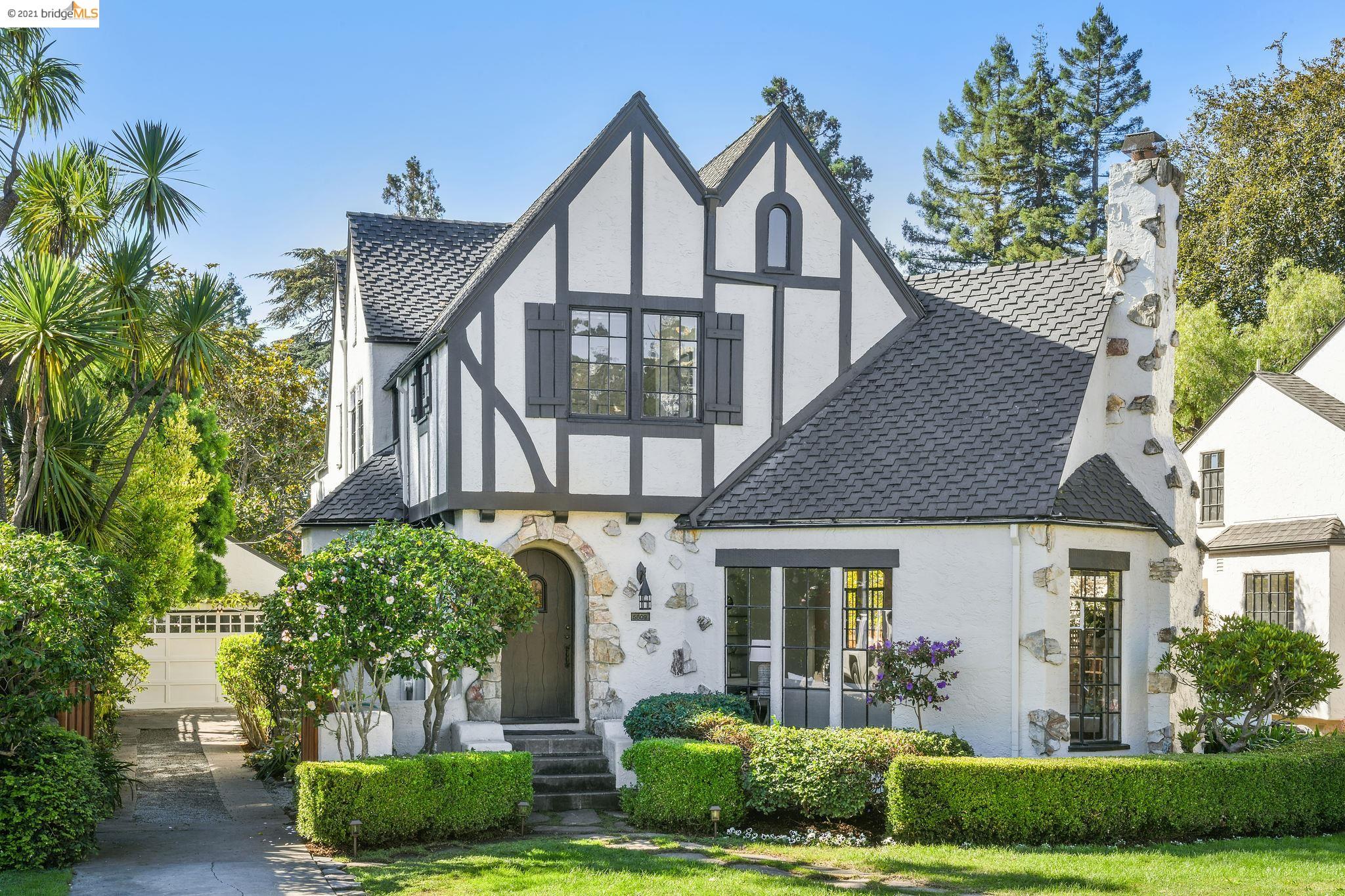 5809 Ross Street Oakland, CA 94618 - Photo 1 of 1 a view of a house with a yard and a garden