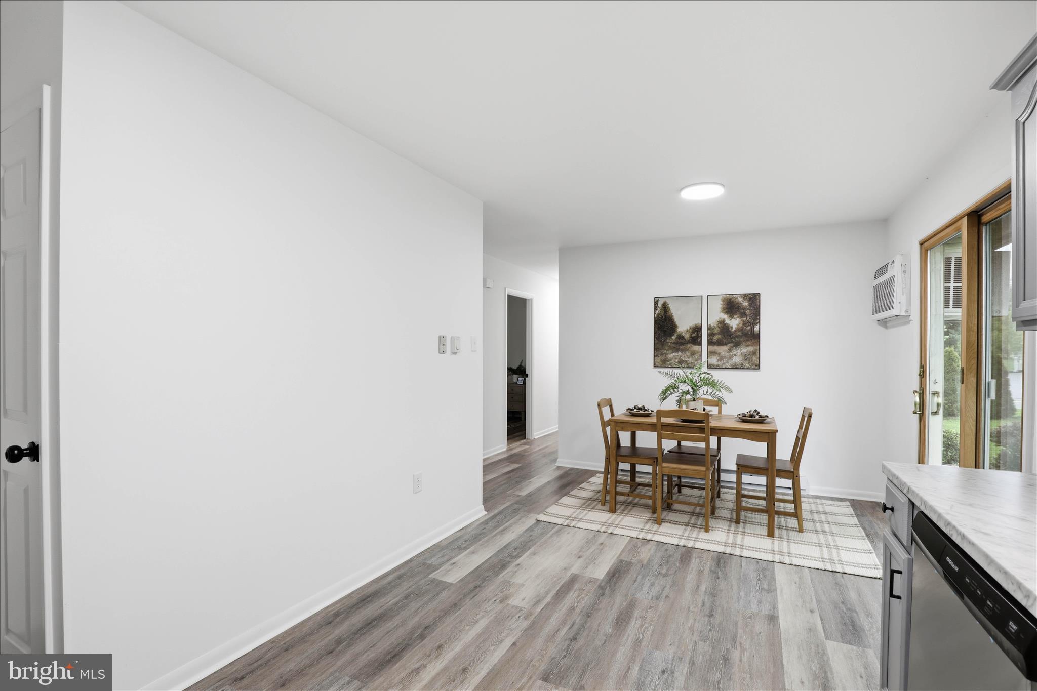 947 Hill Street Manheim, PA 17545 - Photo 14 of 47 a view of a dining room with furniture and wooden floor