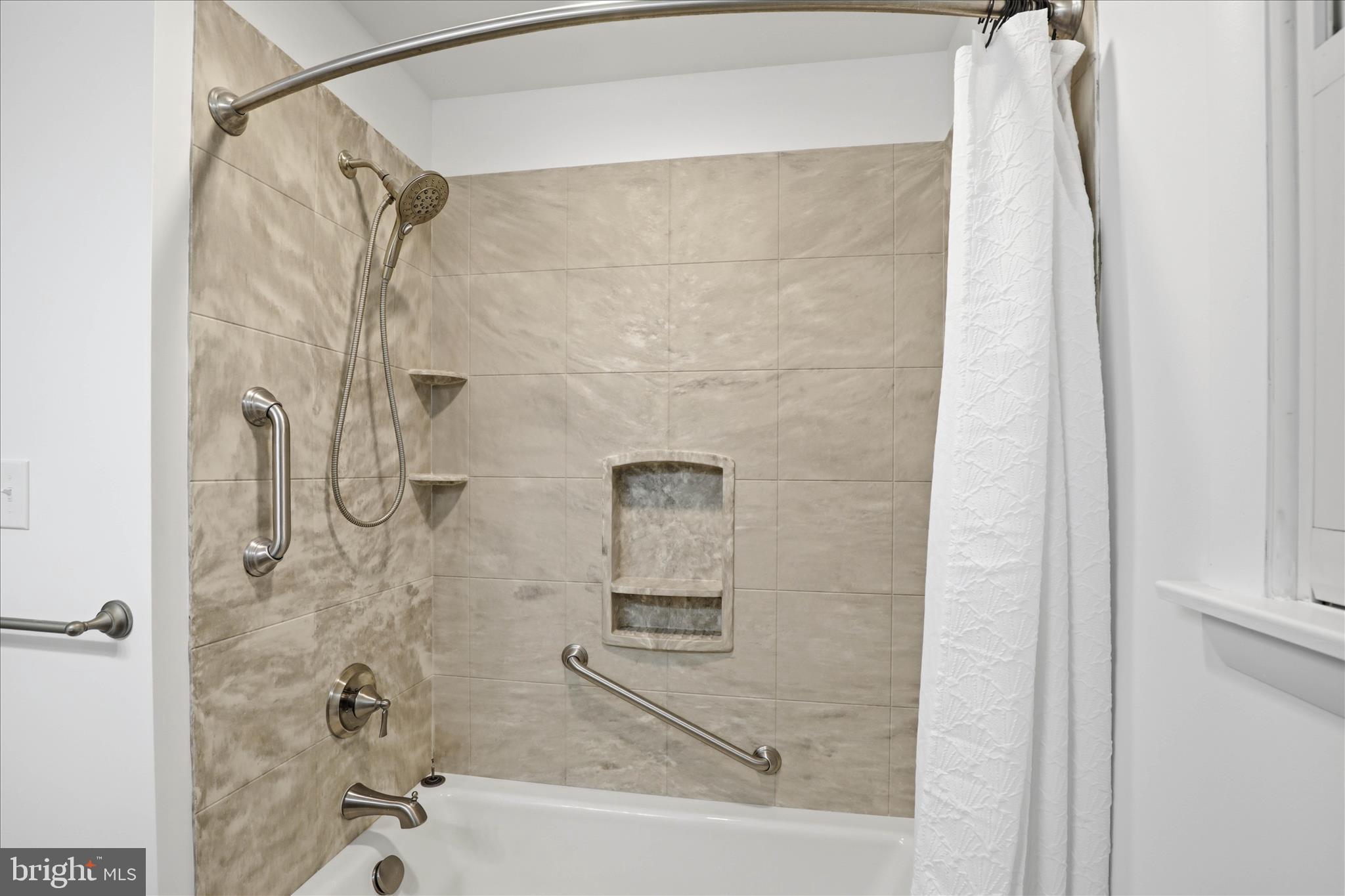 947 Hill Street Manheim, PA 17545 - Photo 21 of 47 a bathroom with a shower and a bath tub