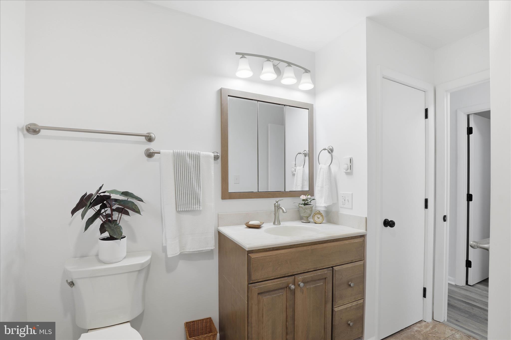947 Hill Street Manheim, PA 17545 - Photo 22 of 47 a bathroom with a sink a toilet and shower