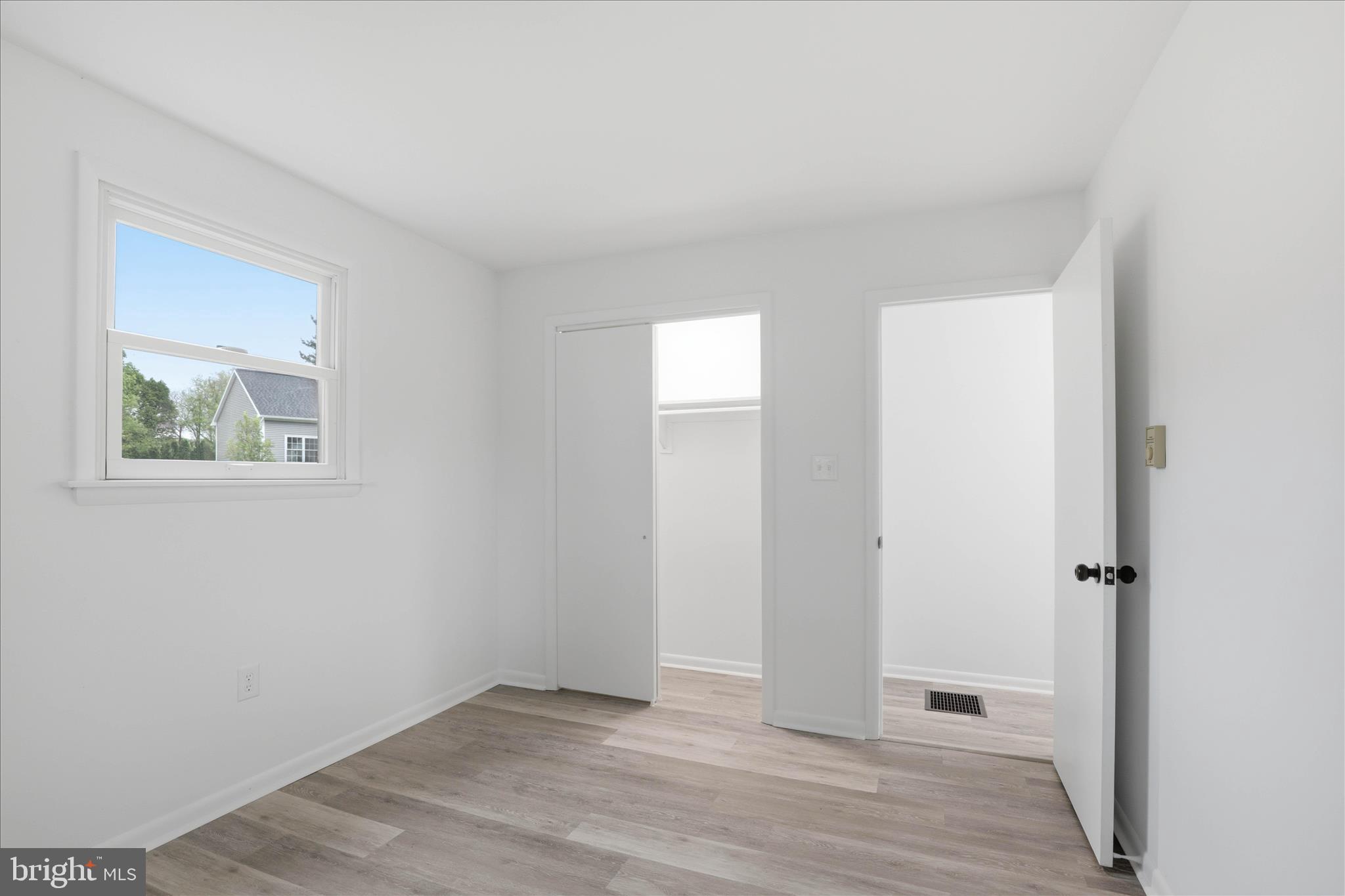 947 Hill Street Manheim, PA 17545 - Photo 28 of 47 an empty room with wooden floor and windows